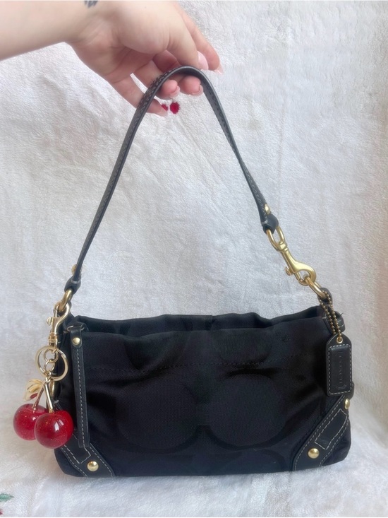Coach Handbags - vintage coach mini carly in black